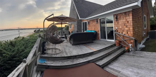 a view of a balcony with an outdoor space