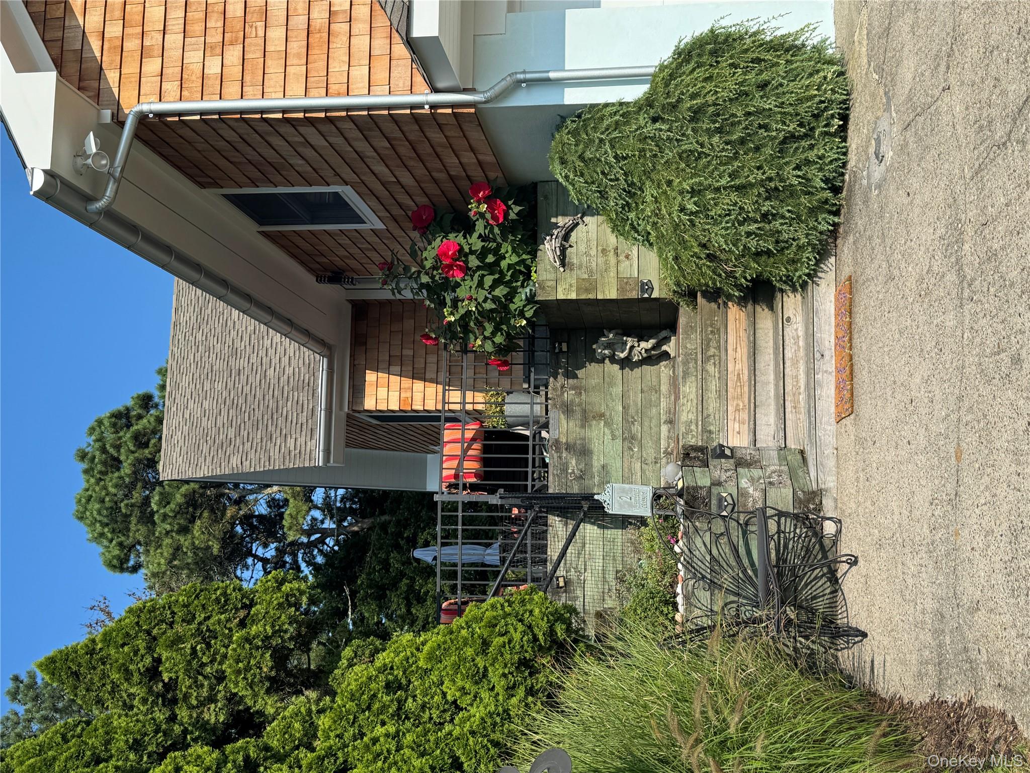 2 West Hillover Road Hampton Bays, NY 11946 - Photo 42 of 42 a view of a house with a yard