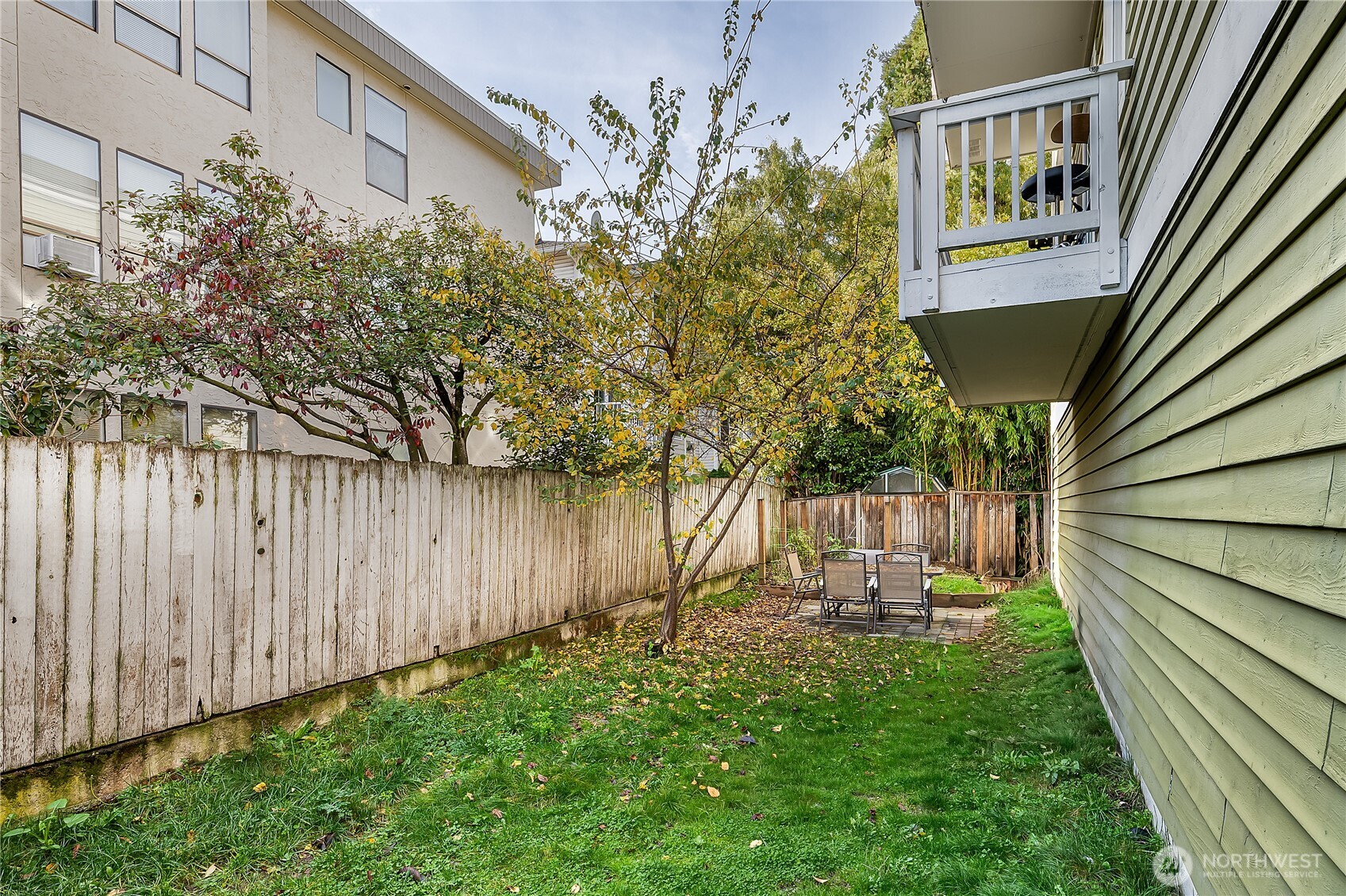 1519 Northwest 59th Street, Unit 101 Seattle, WA 98107 - Photo 20 of 23 a view of a backyard with plants