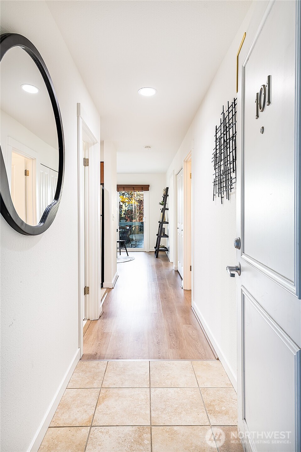 1519 Northwest 59th Street, Unit 101 Seattle, WA 98107 - Photo 2 of 23 a view interior of a house with wooden floor windows and entryway