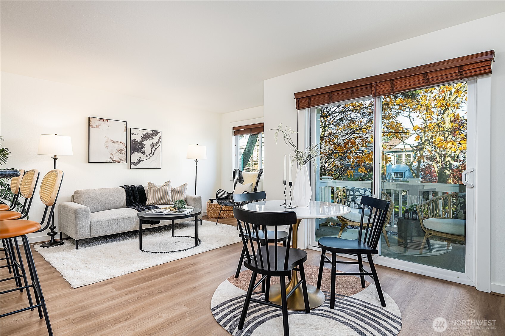 1519 Northwest 59th Street, Unit 101 Seattle, WA 98107 - Photo 3 of 23 a living room with furniture and a large window