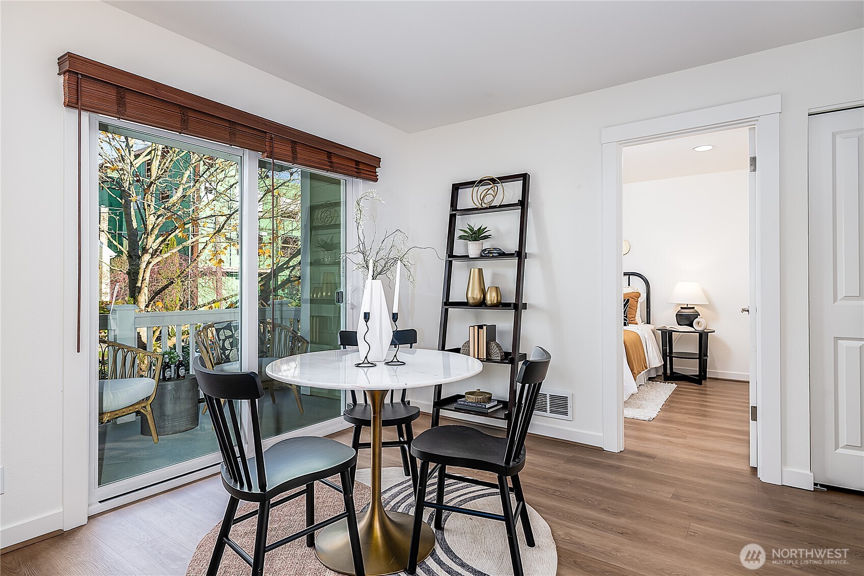 1519 Northwest 59th Street, Unit 101 Seattle, WA 98107 - Photo 5 of 23 a view of a dining room with furniture and a window