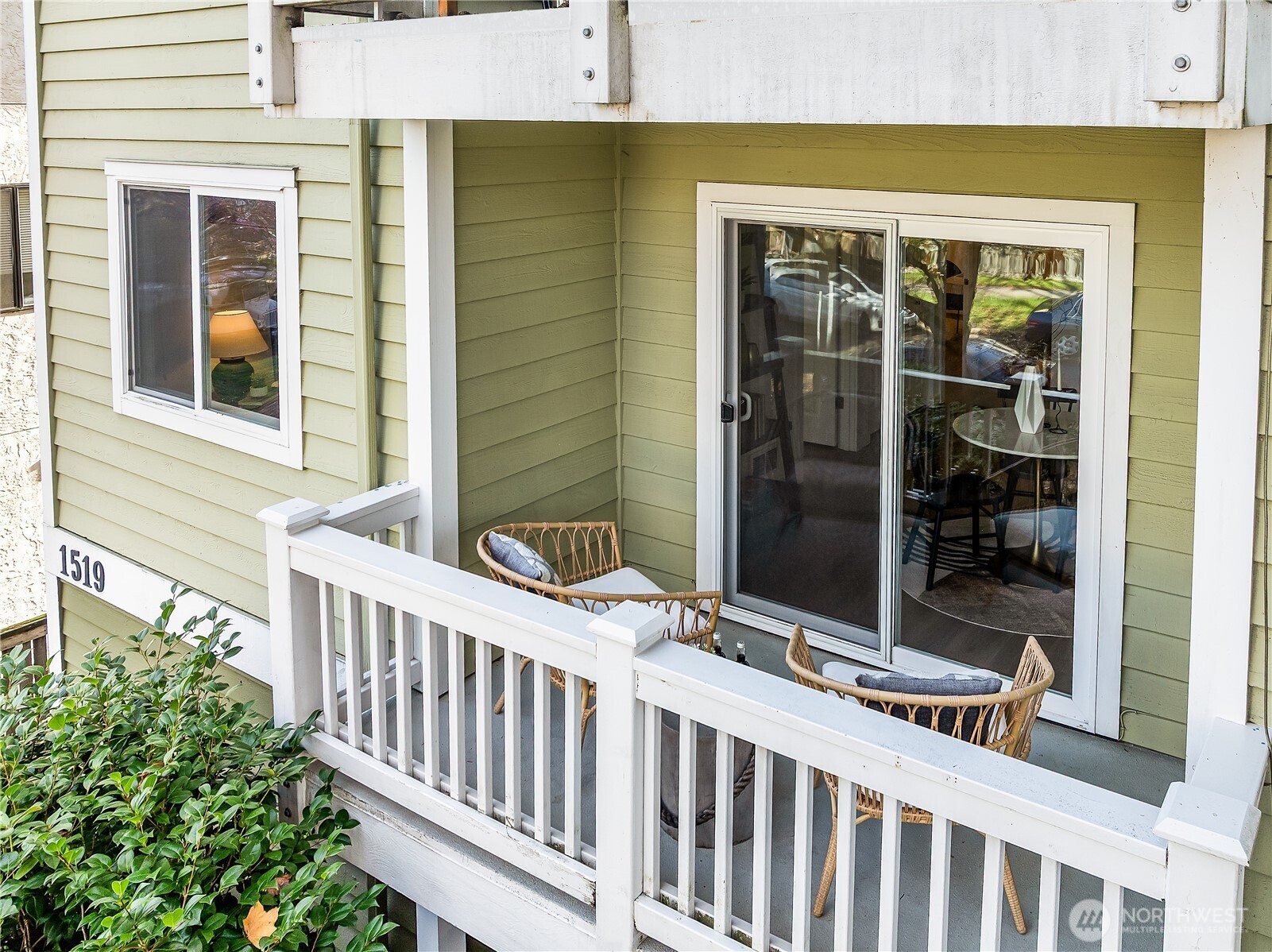 1519 Northwest 59th Street, Unit 101 Seattle, WA 98107 - Photo 7 of 23 a view of a brick house with a large window