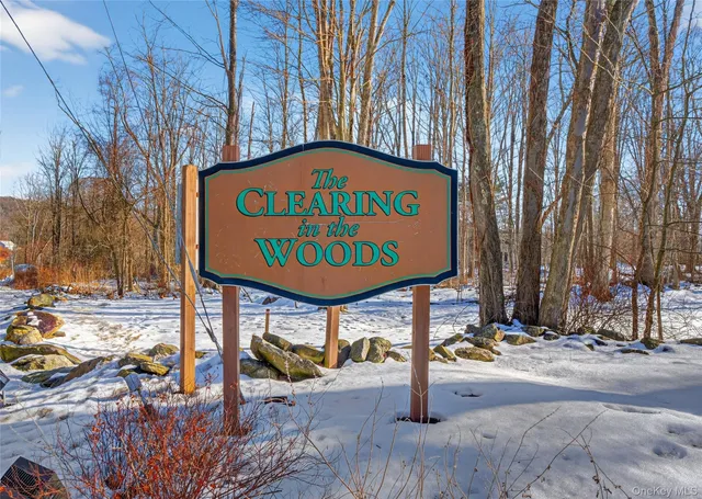 a view of a street with sign board