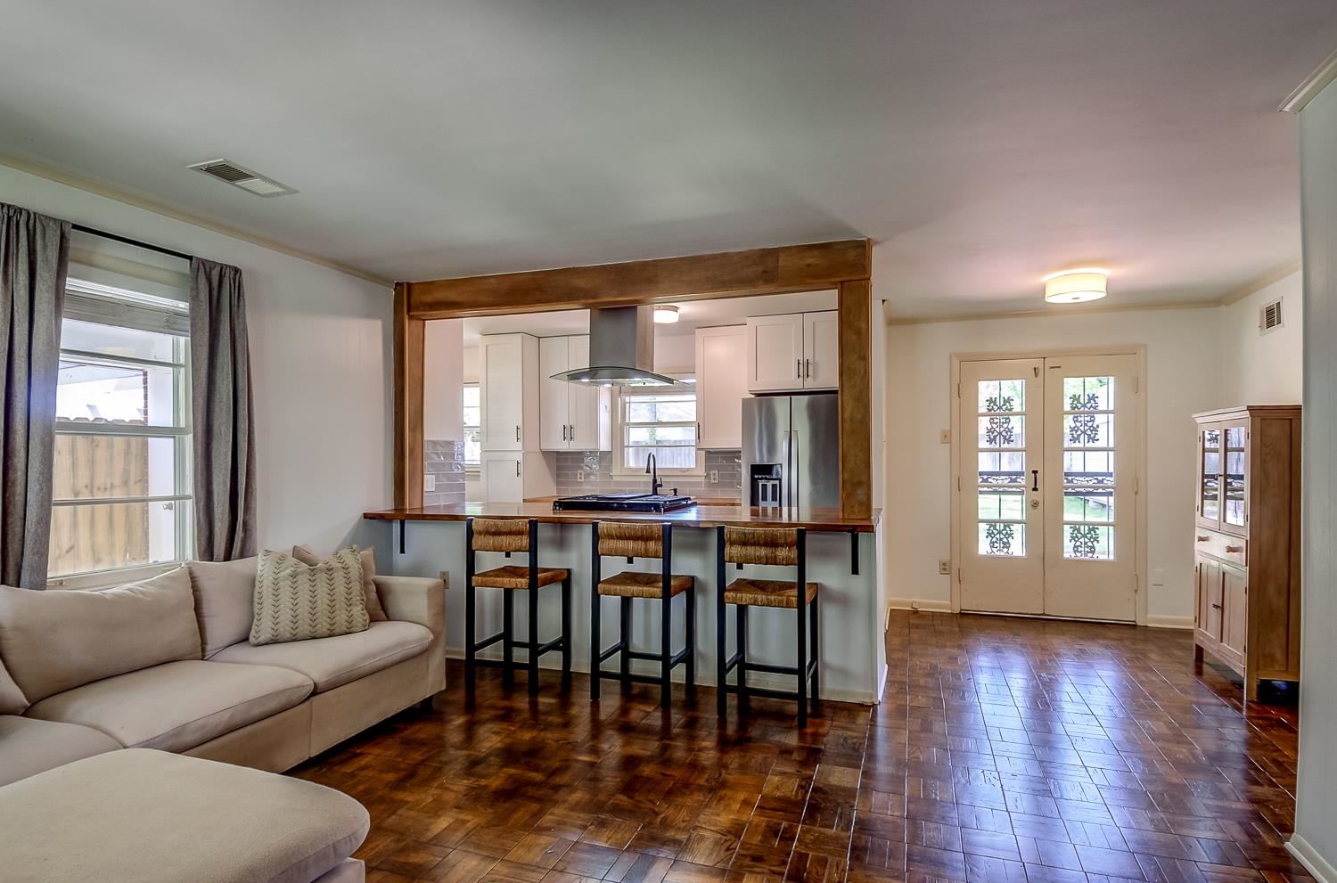 5056 Wingdale Road Memphis, TN 38117 - Photo 7 of 18 Living room featuring parquet floors and crown molding
