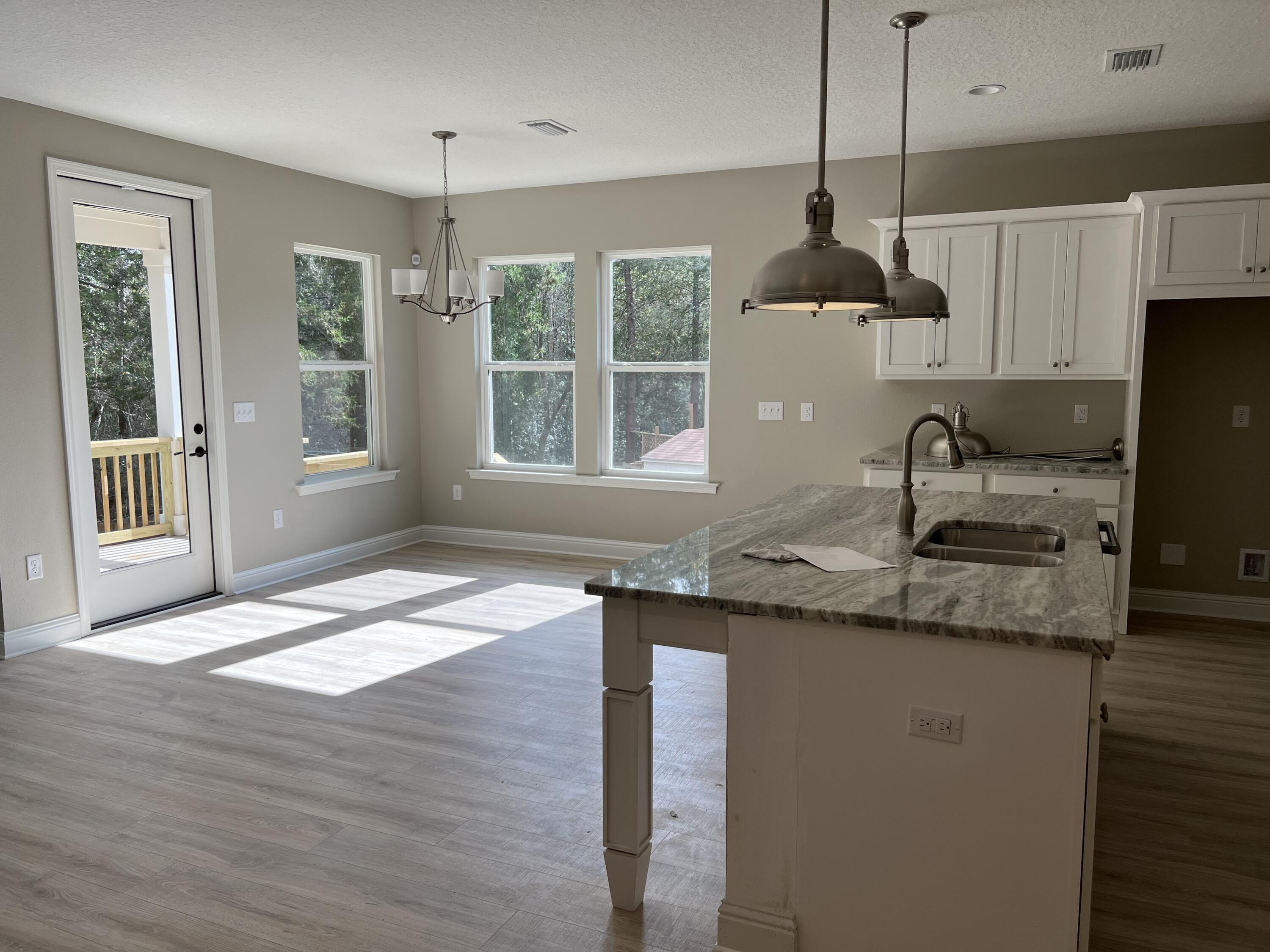323 Key Lime Place Crestview, FL 32536 - Photo 3 of 15 Kitchen and Dining Room