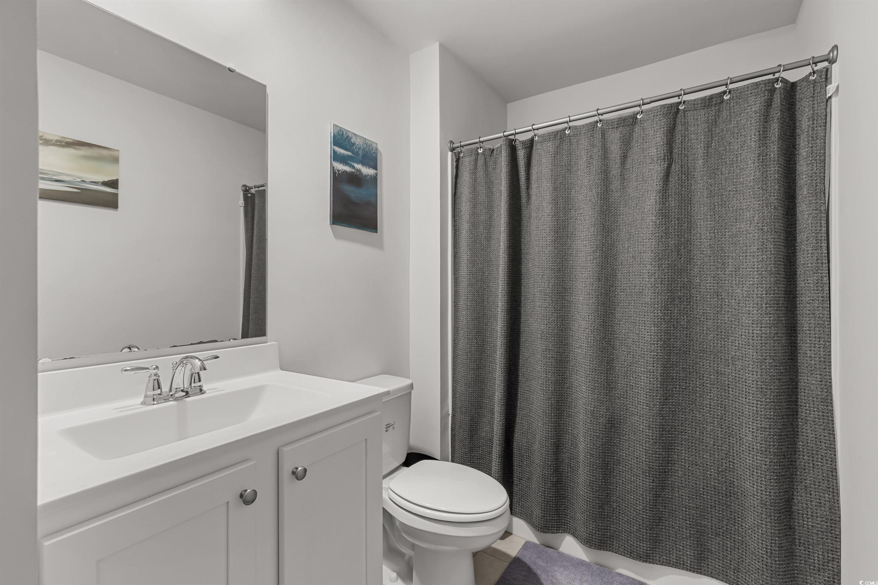 2004 Musgrove Mill Way Myrtle Beach, SC 29579 - Photo 22 of 35 Bathroom featuring toilet and vanity