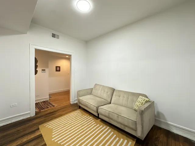 a living room with a couch and a coffee table
