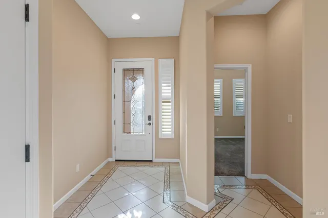 an empty room with mirror