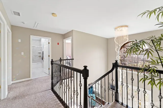 a view of a hallway with a furniture