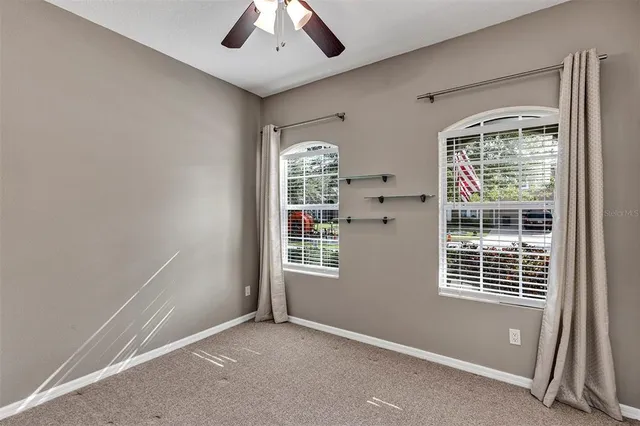 an empty room with windows