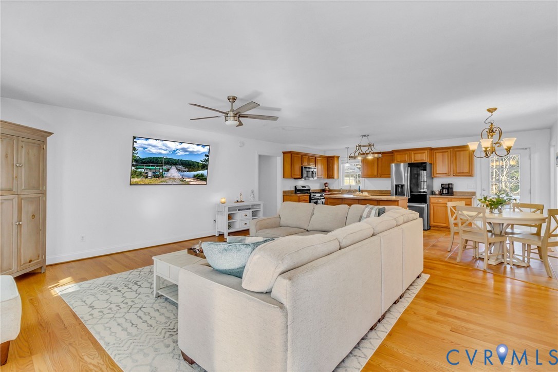 43 Ruddy Duck Road Heathsville, VA 22473 - Photo 4 of 46 a living room with furniture and a wooden floor