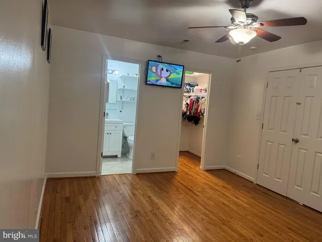 a view of a livingroom with wooden floor