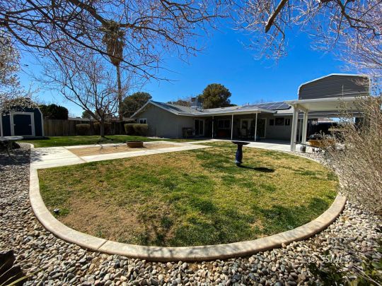 218 South Lilac Street Ridgecrest, CA 93555 - Photo 33 of 43 a view of a swimming pool with an outdoor space
