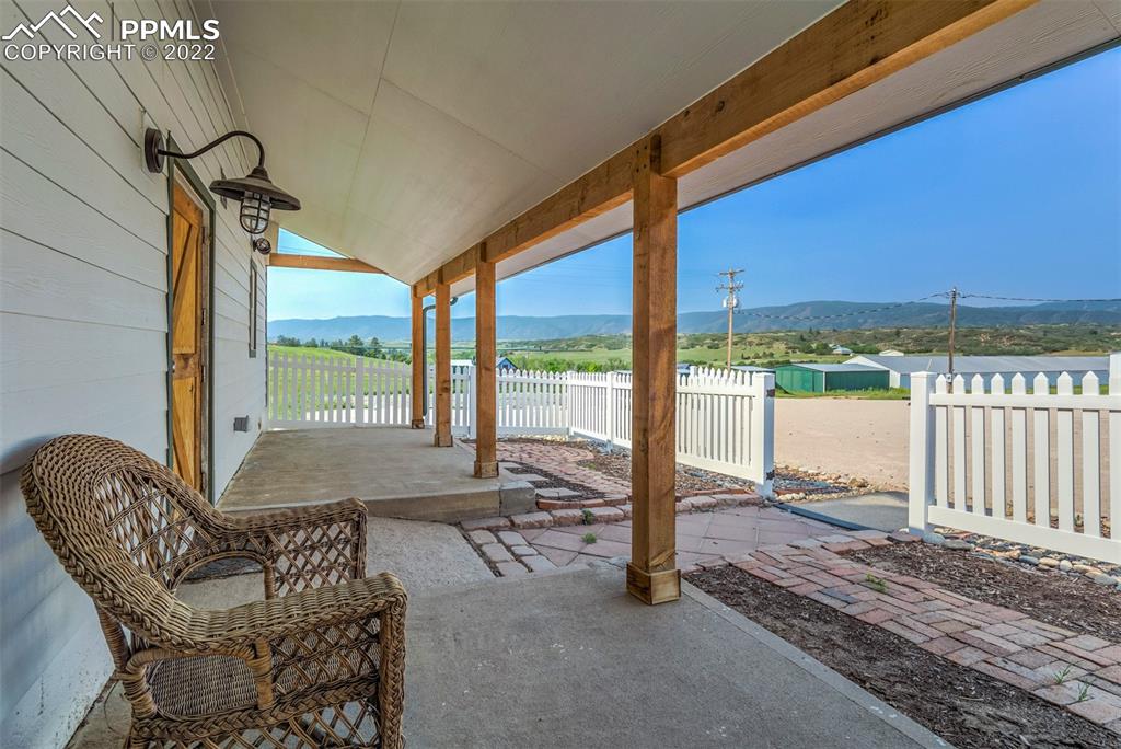 2073 North Perry Park Road Sedalia, CO 80135 - Photo 20 of 40 a building outdoor space with seating space