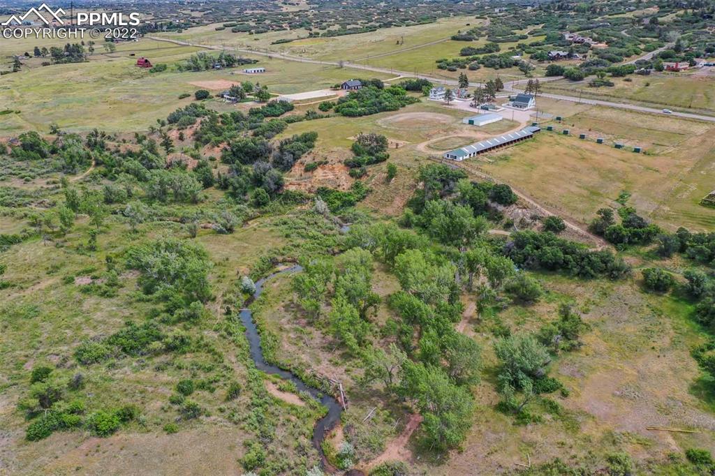 2073 North Perry Park Road Sedalia, CO 80135 - Photo 28 of 40 an aerial view of residential houses with outdoor space