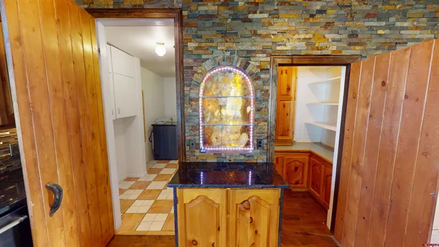 a view of living room with a window and chandelier