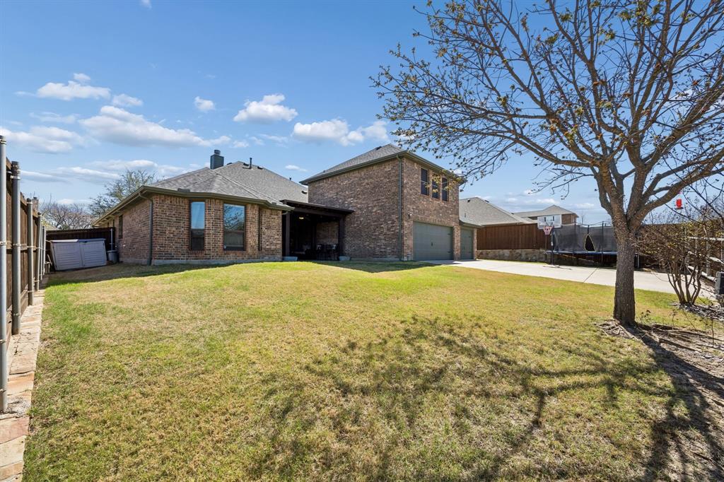 3917 Gatewick Drive Rockwall, TX 75087 - Photo 27 of 34 a house view with swimming pool in front of it
