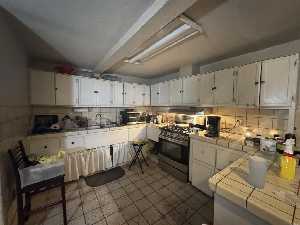 2310 Highway 86 Brawley, CA 92227 - Photo 11 of 30 a kitchen with cabinets appliances and a sink