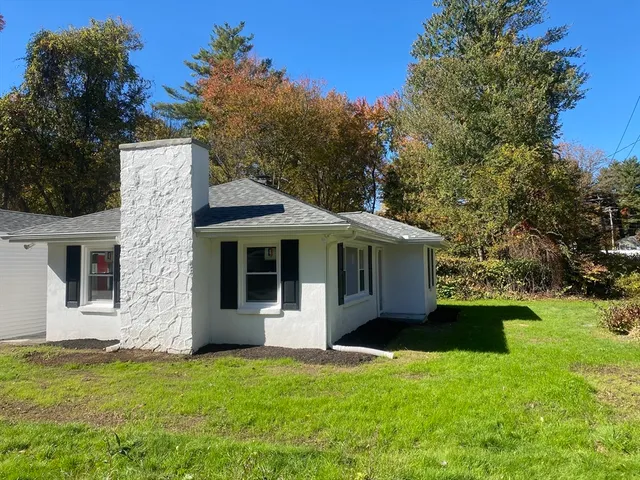 a view of a house with a garden
