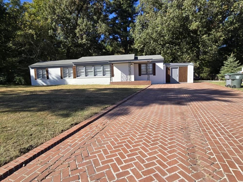 4491 Raleigh Millington Road Memphis, TN 38128 - Photo 1 of 16 Lovely brick home on large lot. Some of the best features are a separate dining room and laundry room. Spacious rooms, large back yard, plenty of room for everyone to feel at home. The seller spared no expenses in remodeling for the new owners. YOU!