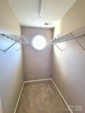 a view of a room with racks on the wall