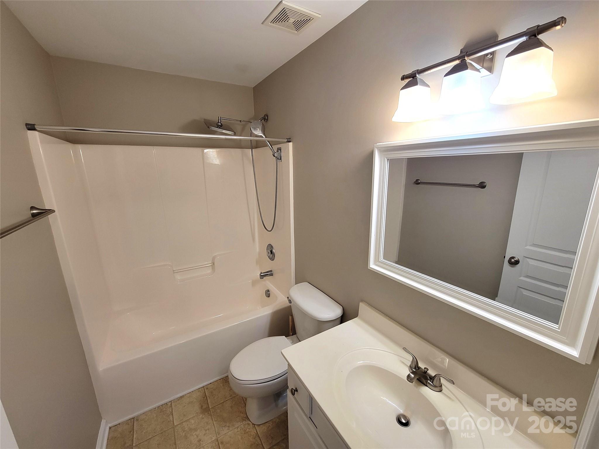 1036 Tabard Lane Matthews, NC 28104 - Photo 7 of 13 a bathroom with a sink toilet and shower