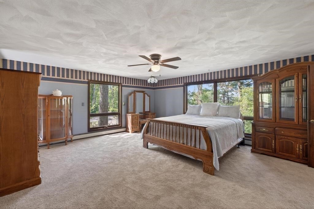 38 Gaudette Street Fall River, MA 02721 - Photo 32 of 41 a spacious bedroom with a bed and a large window