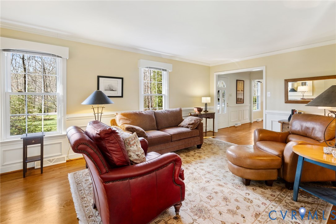 1530 Greenberry Road Powhatan, VA 23139 - Photo 12 of 49 a living room with furniture and a large window