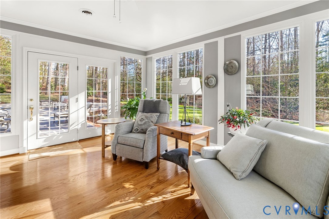 1530 Greenberry Road Powhatan, VA 23139 - Photo 15 of 49 a living room with furniture and floor to ceiling windows