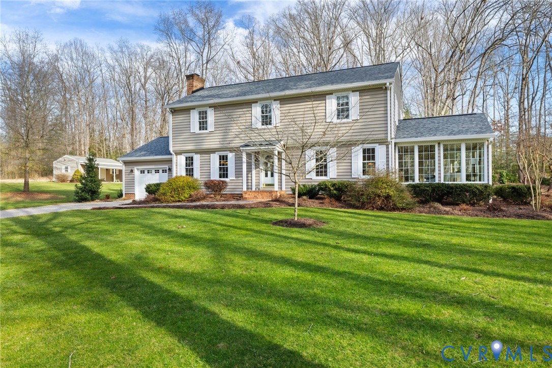 1530 Greenberry Road Powhatan, VA 23139 - Photo 2 of 49 a front view of house with yard and green space