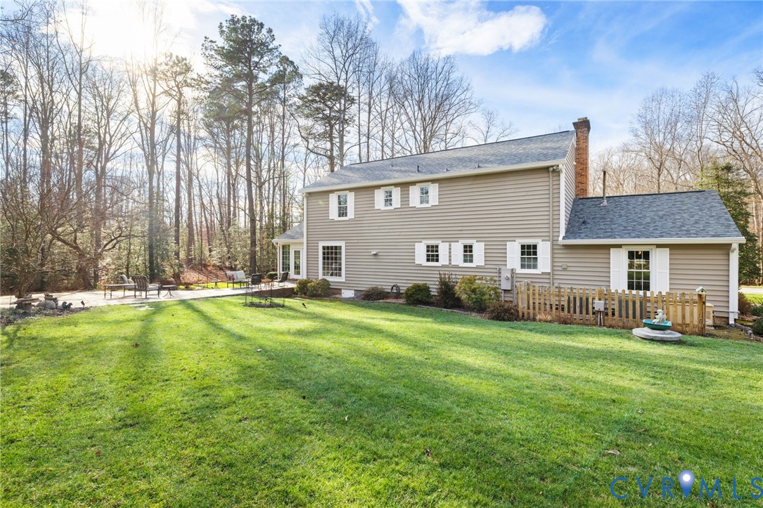 1530 Greenberry Road Powhatan, VA 23139 - Photo 37 of 49 a view of a house with a big yard and large trees