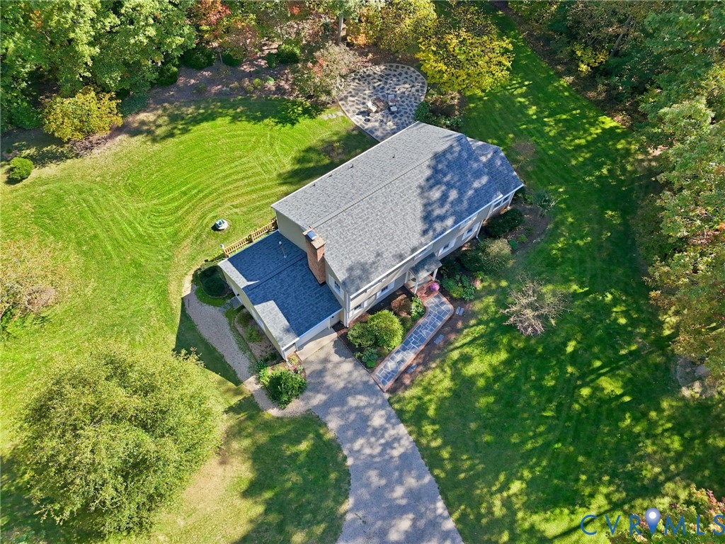 1530 Greenberry Road Powhatan, VA 23139 - Photo 42 of 49 a view of a back yard of the house and a garden