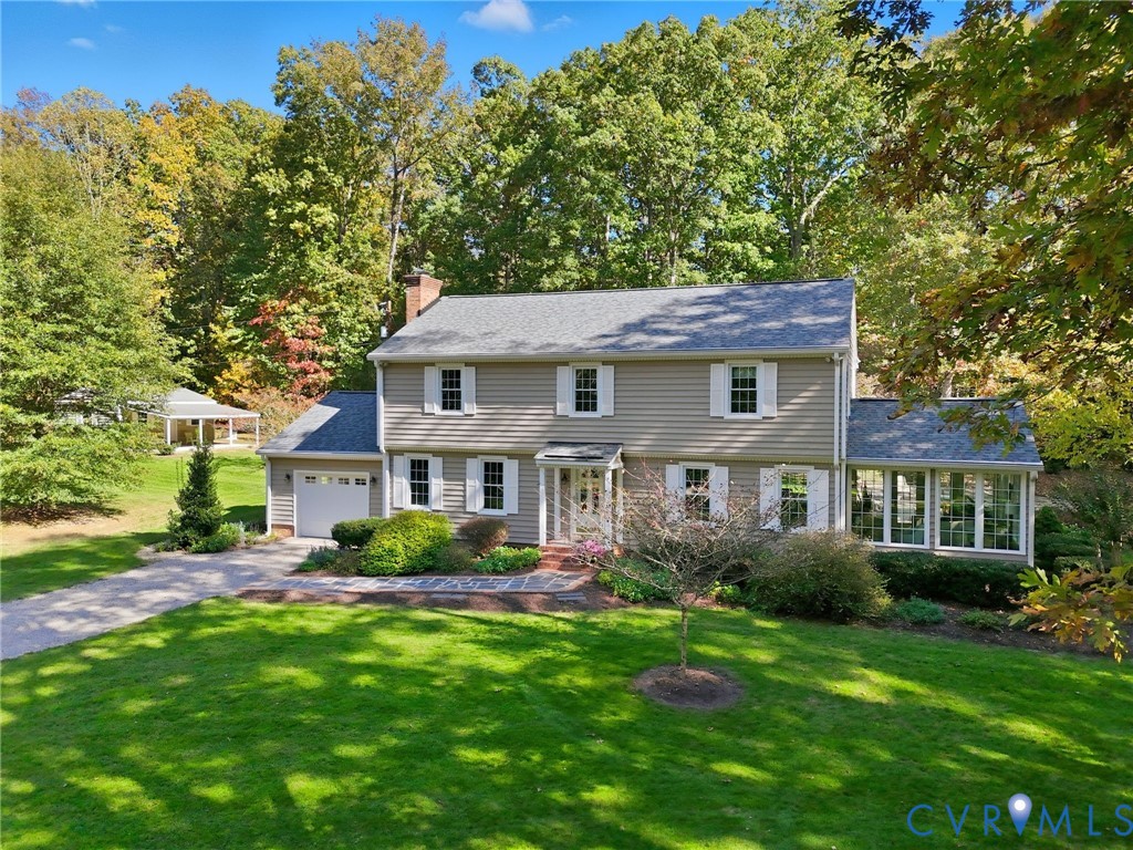 1530 Greenberry Road Powhatan, VA 23139 - Photo 47 of 49 a front view of a house with a yard and trees