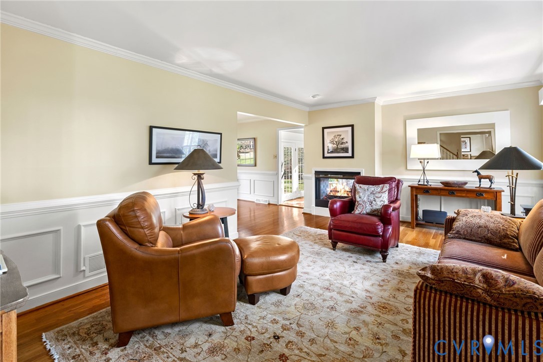 1530 Greenberry Road Powhatan, VA 23139 - Photo 10 of 49 a work room with furniture and a wooden floor