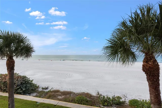 a kitchen with granite countertop lots of counter top space and stainless steel appliances