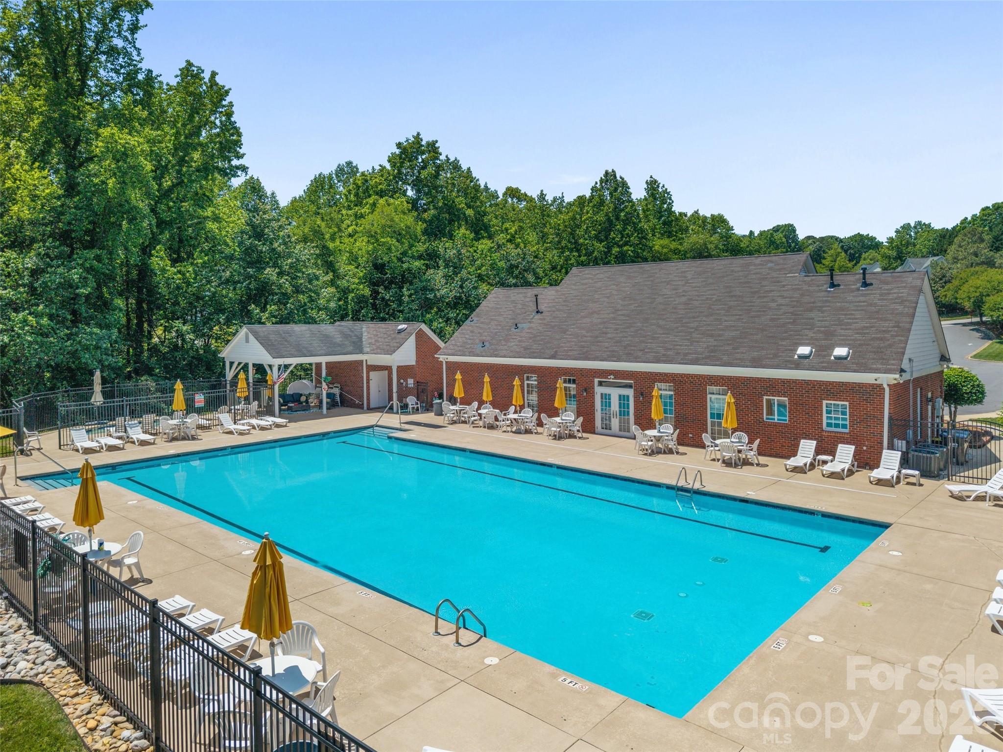 620 East Cheval Drive Fort Mill, SC 29708 - Photo 45 of 48 a view of a house with pool and chairs