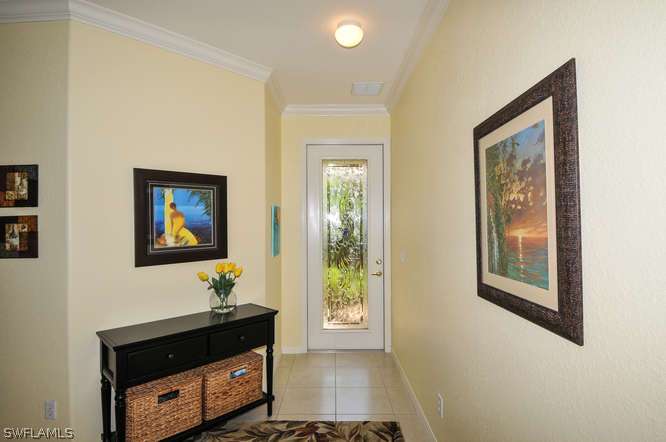 4688 Fairloop Lehigh Acres, FL 33973 - Photo 8 of 24 a living room with furniture and a window