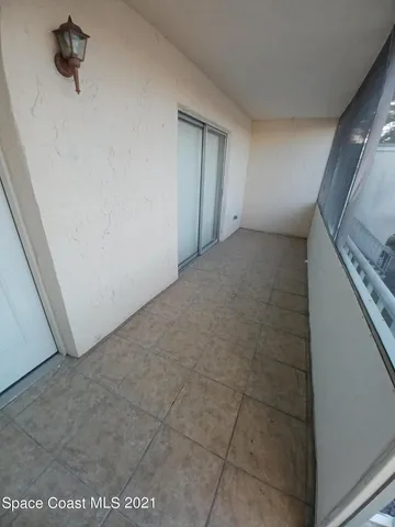 a view of a hallway to a room