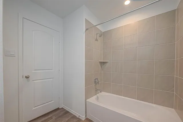 a bathroom with a bathtub