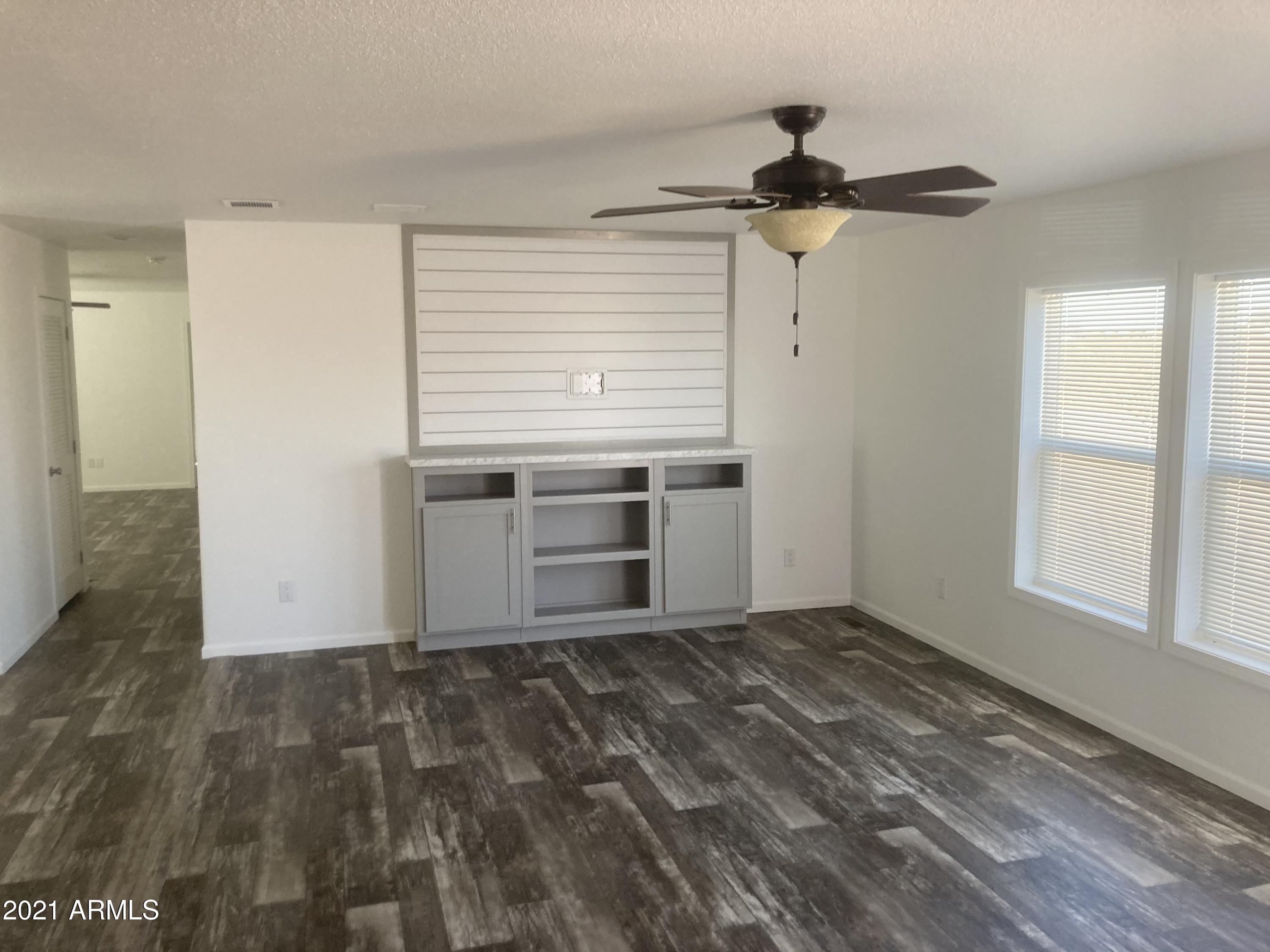 21223 West Sleepy Ranch Road Wittmann, AZ 85361 - Photo 2 of 15 Family Room view 1