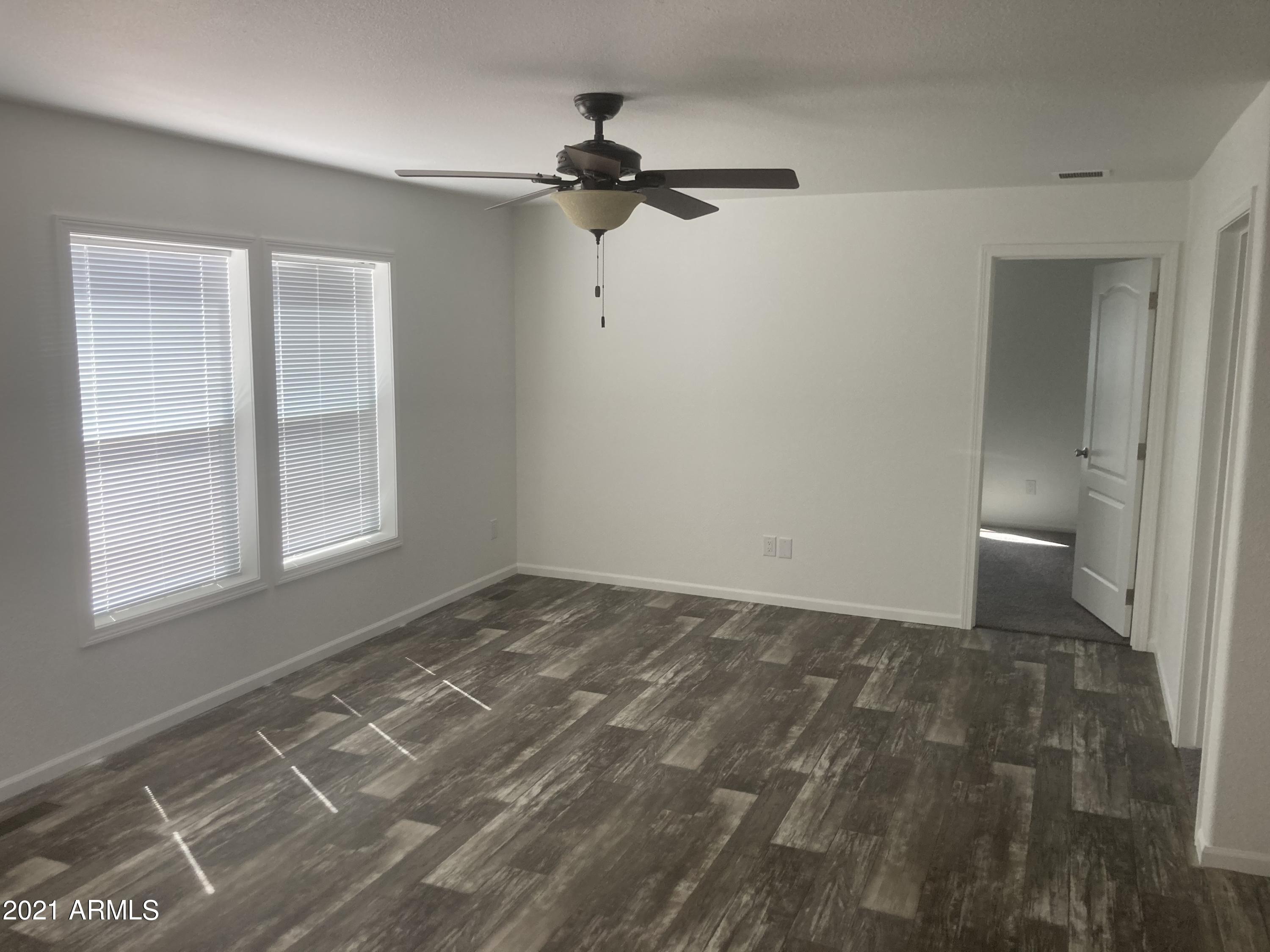 21223 West Sleepy Ranch Road Wittmann, AZ 85361 - Photo 3 of 15 Family Room view 2