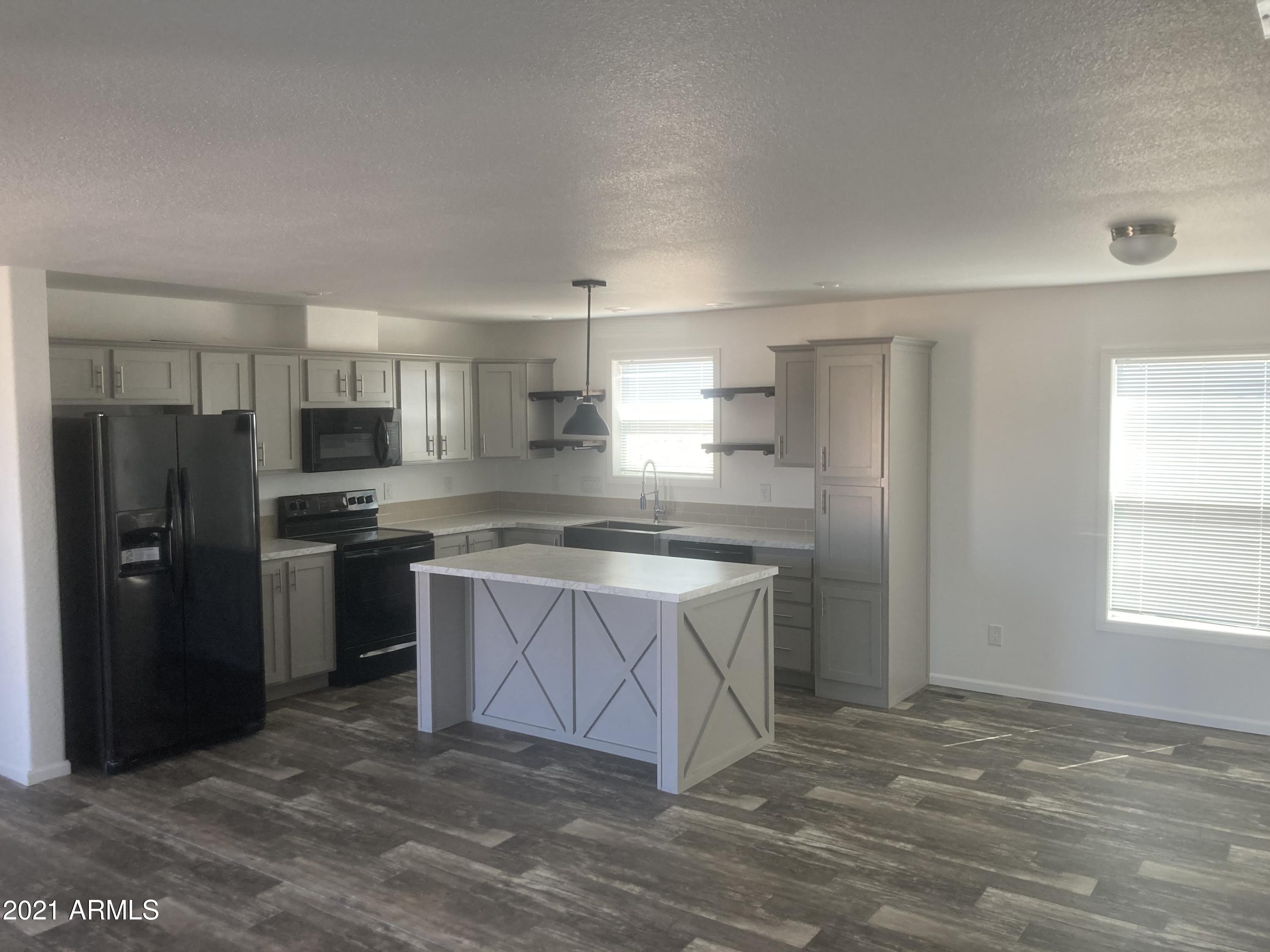 21223 West Sleepy Ranch Road Wittmann, AZ 85361 - Photo 5 of 15 Kitchen view 1