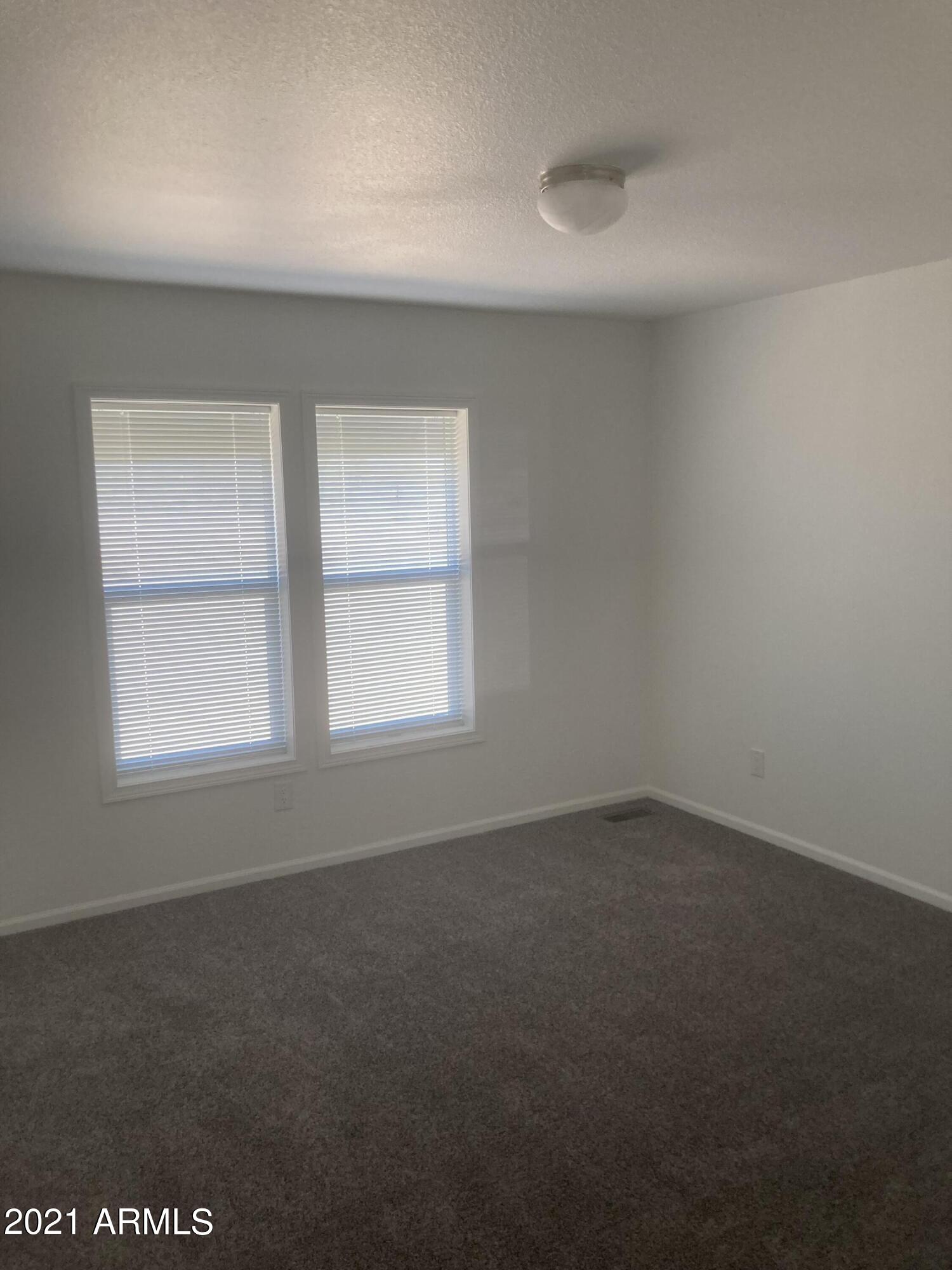 21223 West Sleepy Ranch Road Wittmann, AZ 85361 - Photo 8 of 15 Bedroom view 2