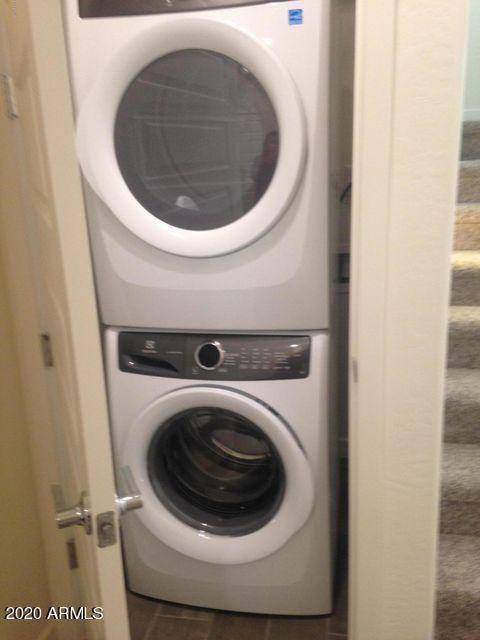 4038 East Erie Street, Unit 101 Gilbert, AZ 85295 - Photo 2 of 7 a close up view of a washer and dryer