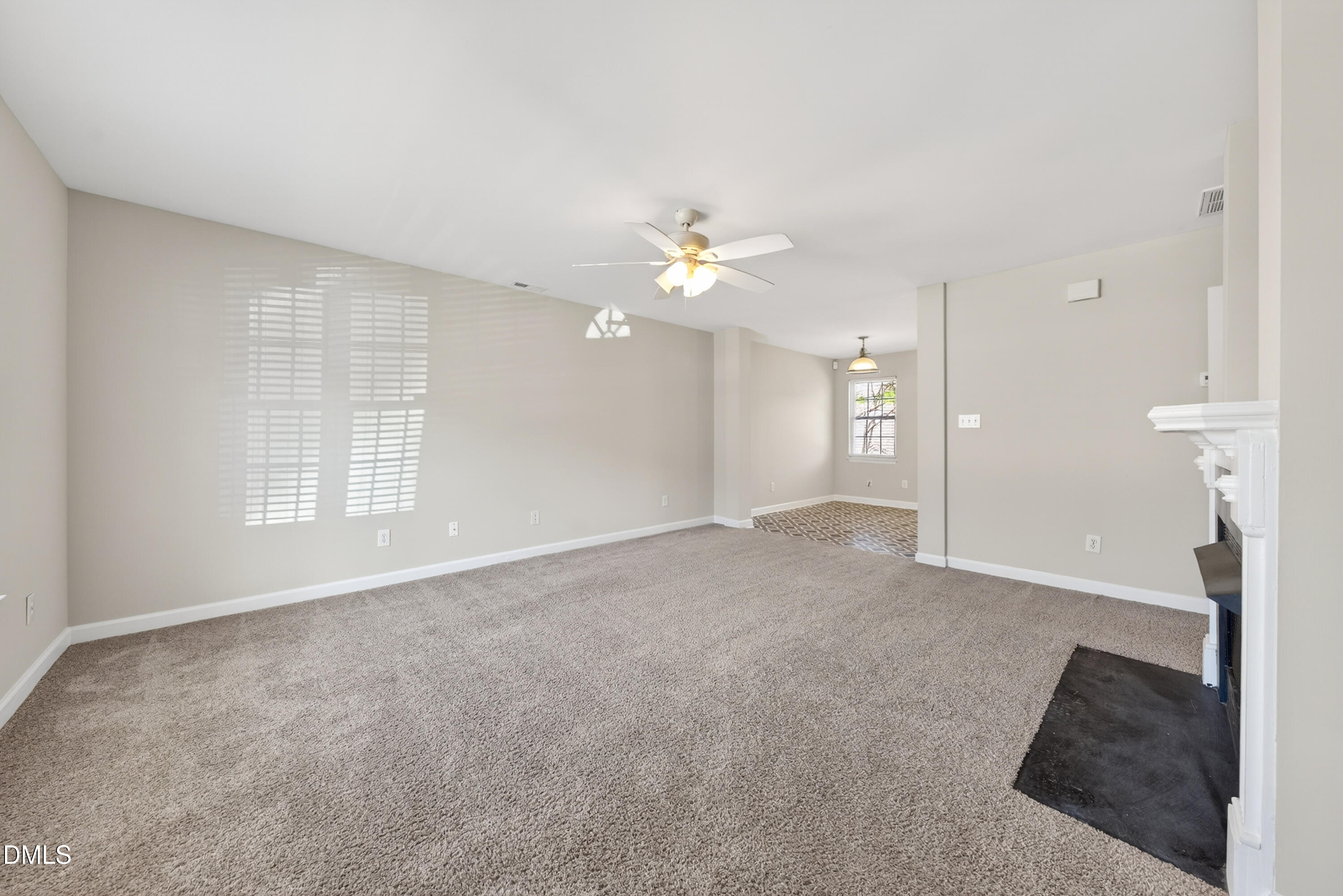 1601 Briarmont Court Raleigh, NC 27610 - Photo 5 of 30 a view of an empty room with a window