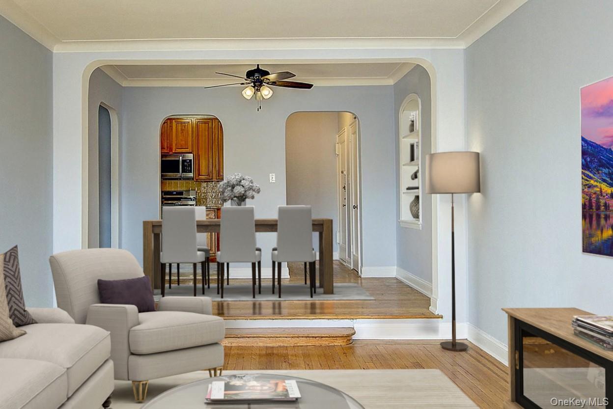 77-14 113th Street, Unit 4S Queens, NY 11375 - Photo 12 of 40 a living room with furniture and a fireplace