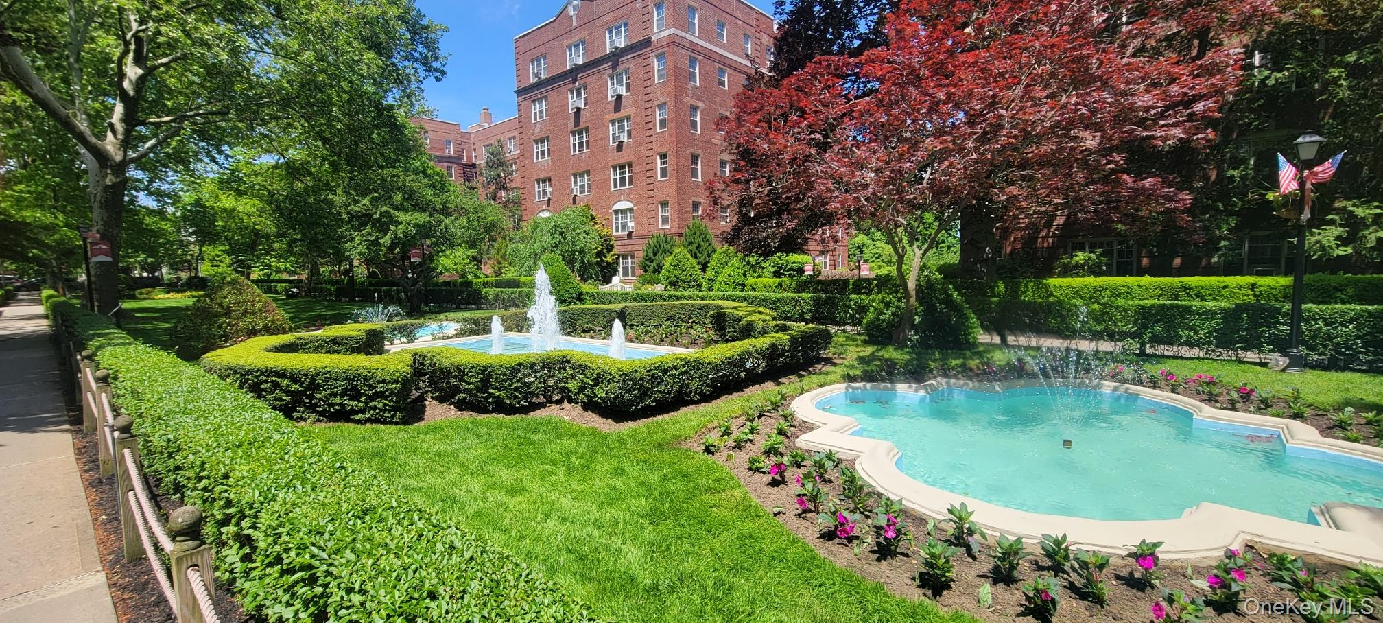 77-14 113th Street, Unit 4S Queens, NY 11375 - Photo 31 of 40 a view of a garden with swimming pool