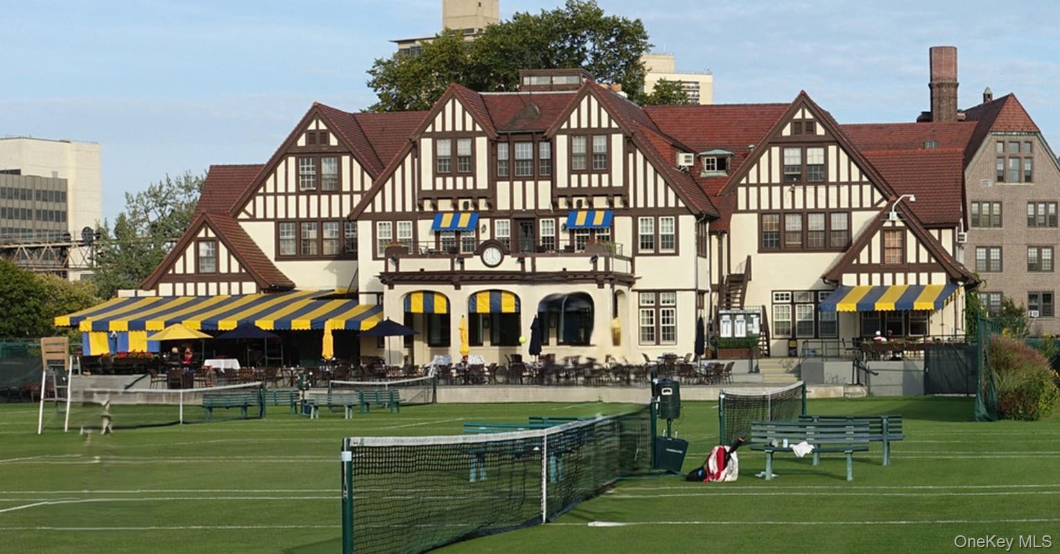 77-14 113th Street, Unit 4S Queens, NY 11375 - Photo 38 of 40 a view of a big building next to a big yard