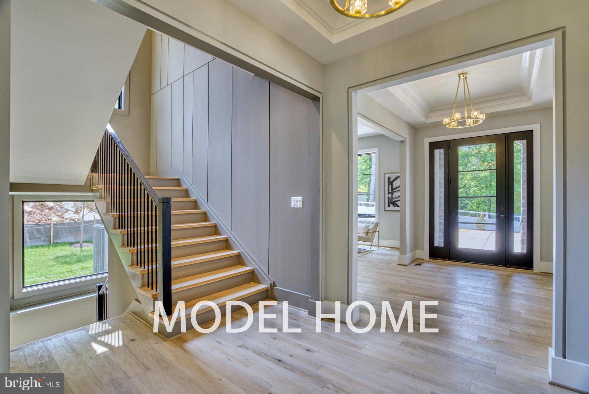 911 Desale Street Southwest Vienna, VA 22180 - Photo 6 of 59 a view of an entryway with wooden floor and door